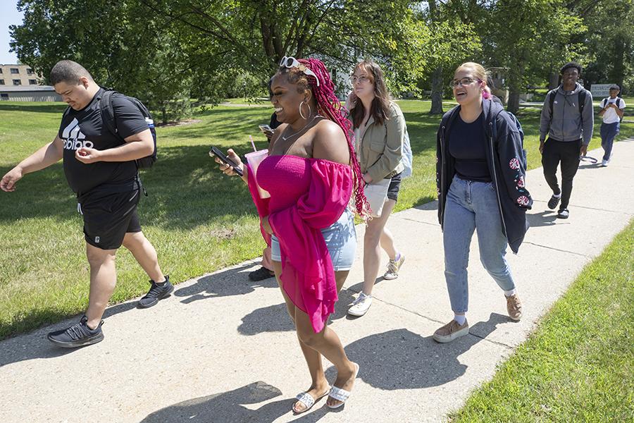 Students walk through campus.