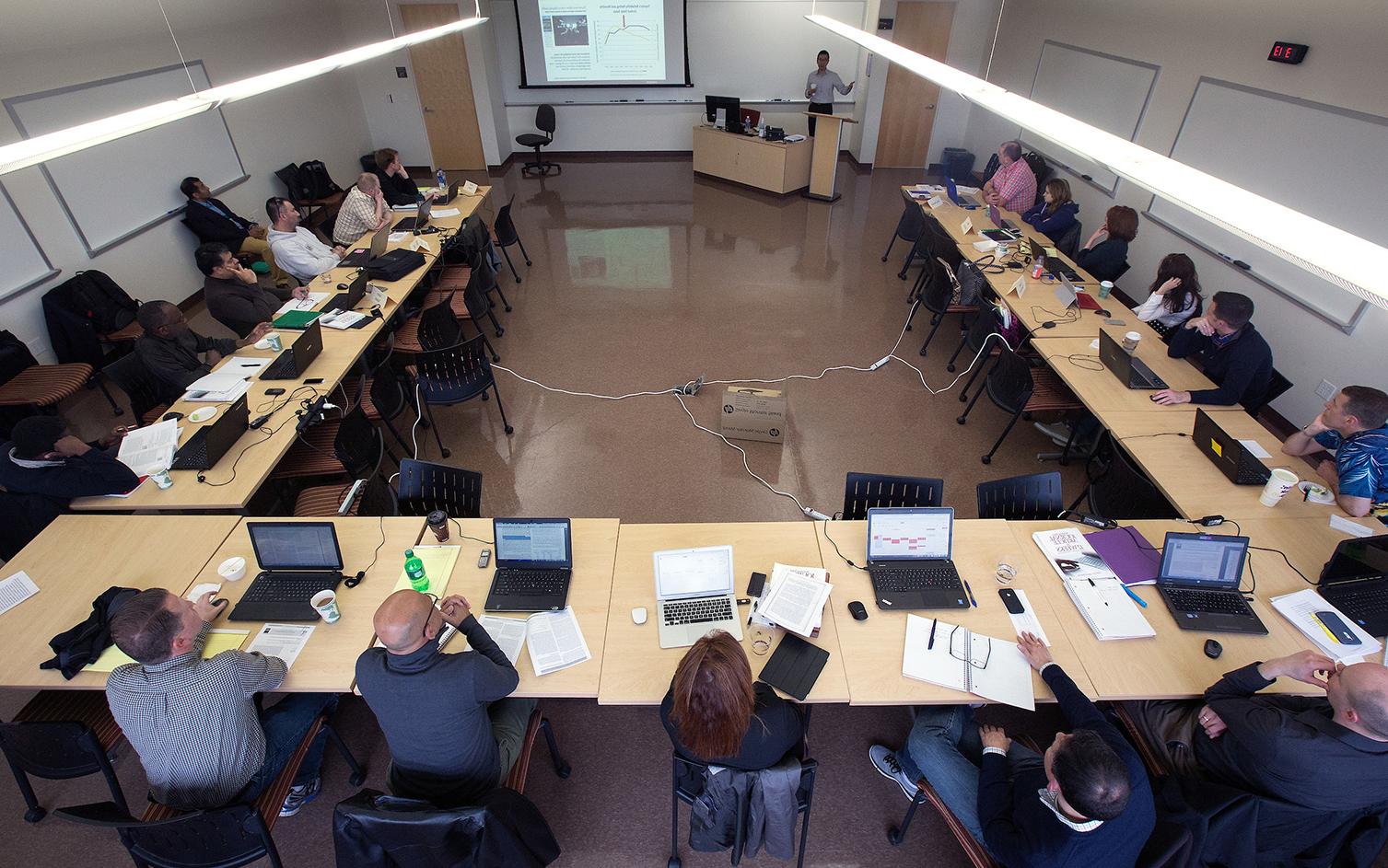 Henry Balani, seated at right with a green binder in front of him, was a member of the first cohort of <a href='http://qdlrhk.zhkkxj.com'>足彩平台</a>’s DBA program.