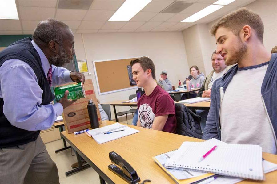 Students in class with a faculty member.