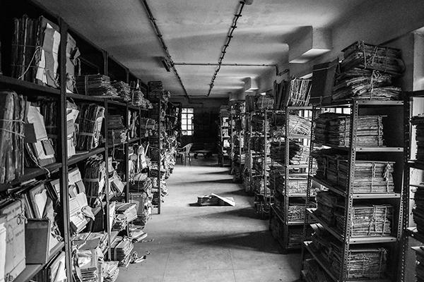 shelves of manuscripts in black and white