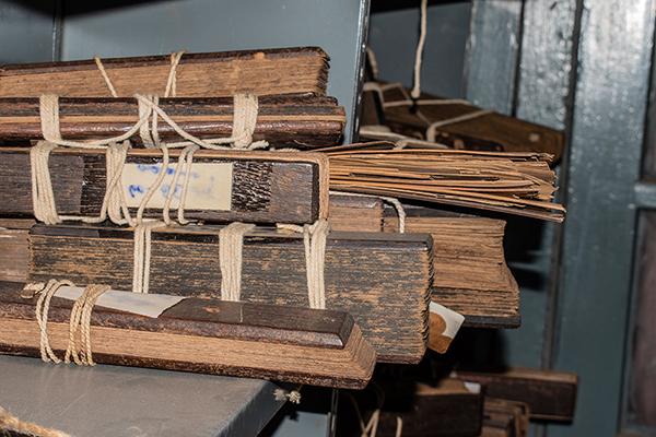 Piles of manuscripts tied together with string